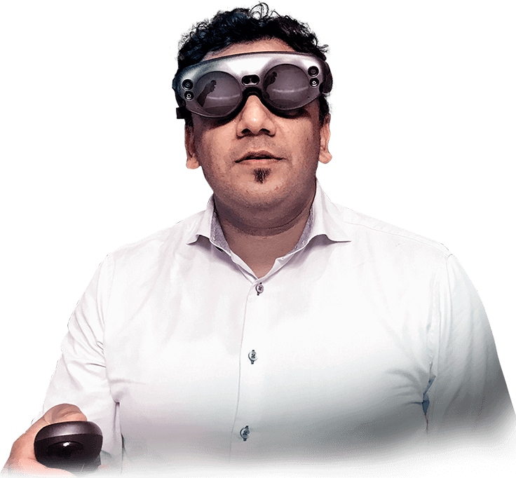 Majeed Rana, MD, wears mixed reality glasses and holds the system controller