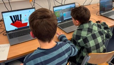 students-coding-3d-modeling-education.webp