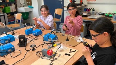 students-soldering-electronics-workshop-stem.webp