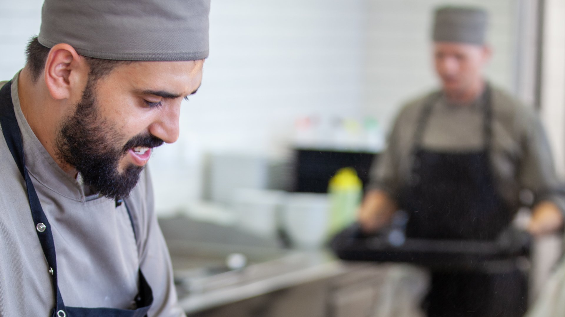 Restaurant employees are preparing food